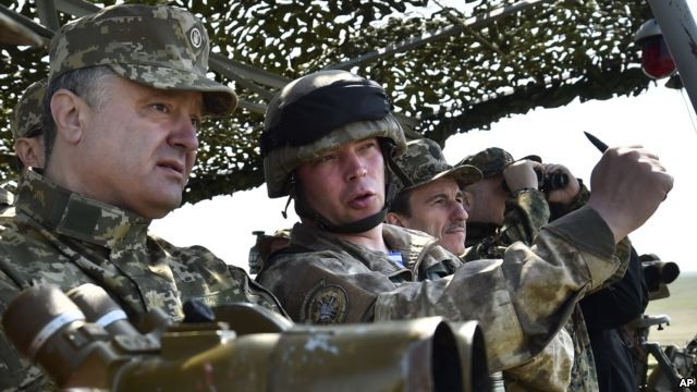 Eastern Ukraine fighting continues despite ceasefire  - ảnh 1